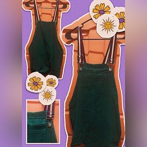 90s inspired green corduroy green skirt overalls with striped strap detailing